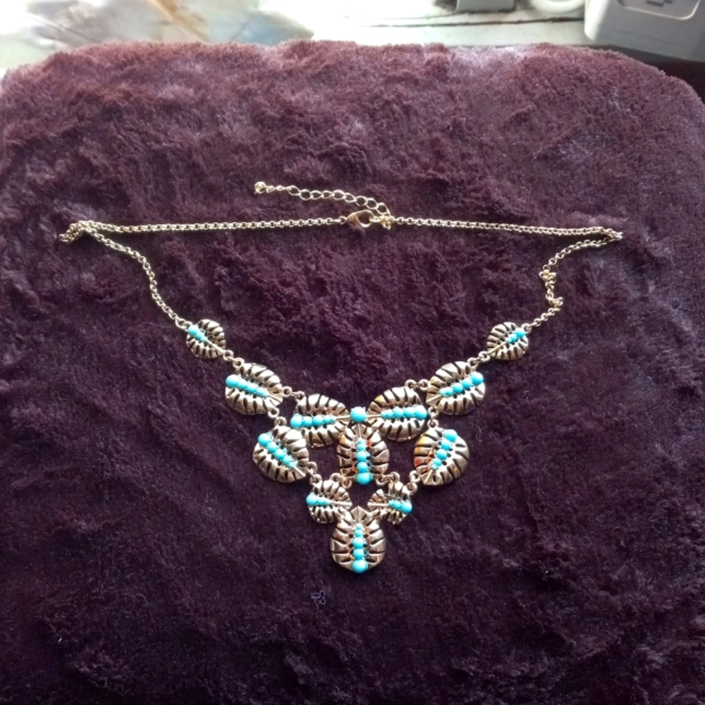 Bohemian Teal stones set in a gold toned chain